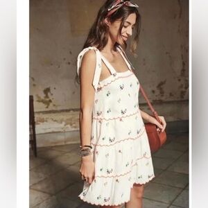 Sezane Anne mini dress. Embroidered flowers and scalloped hem
